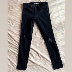 Levi’s 712 Black Distressed Skinny Jeans